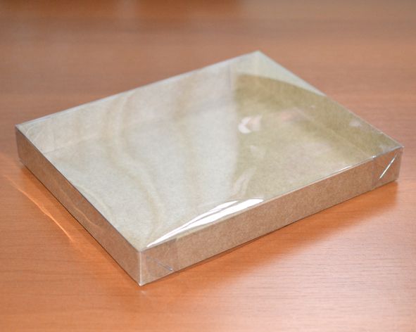 Caixa papel kraft tampa transparente - 24x19x3 cm (un)